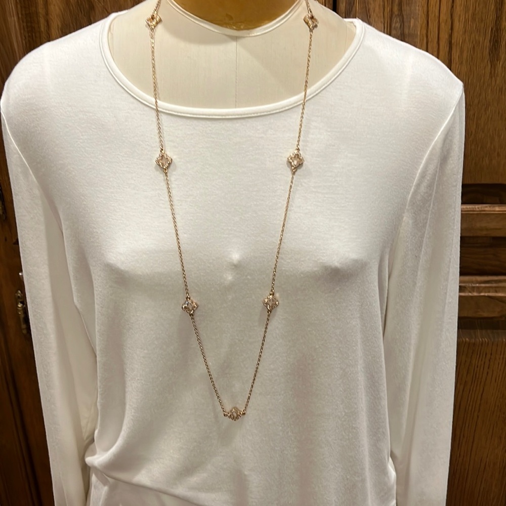 NWOT Gold necklace with clear rhinestones.